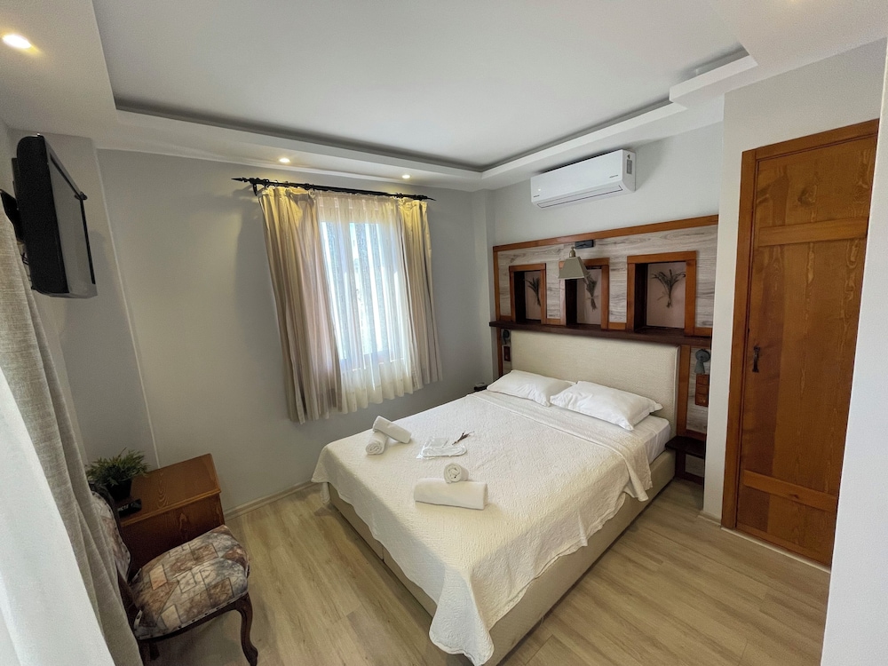 Family Quadruple Room, 1 Bedroom, Garden View photo 1