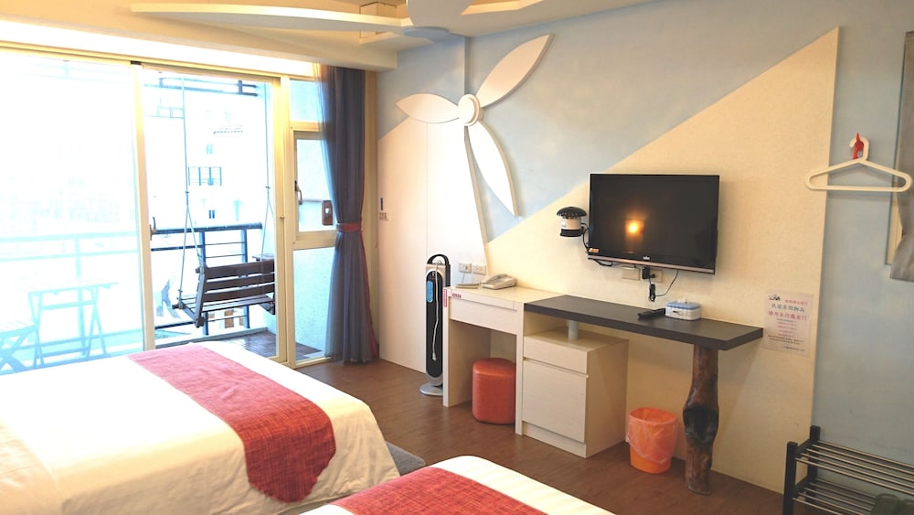 Signature Quadruple Room, 2 Double Beds, Non Smoking, Garden View photo 2