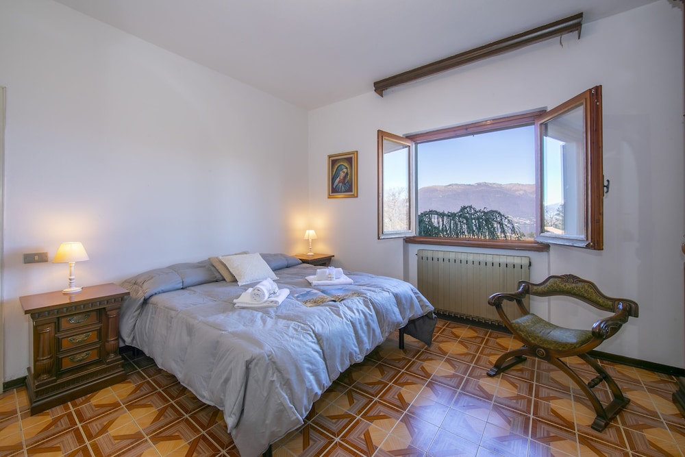 Family Apartment, Multiple Bedrooms, Mountainside (Oasi di Castelveccana Apt Pool and) photo 3