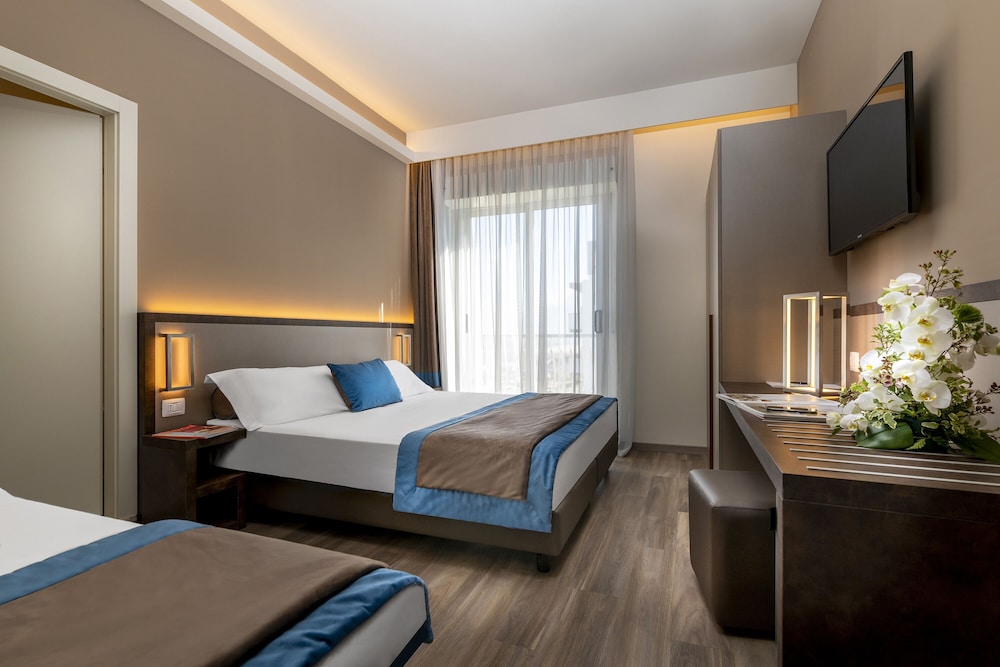 Deluxe Triple Room - Photo 1