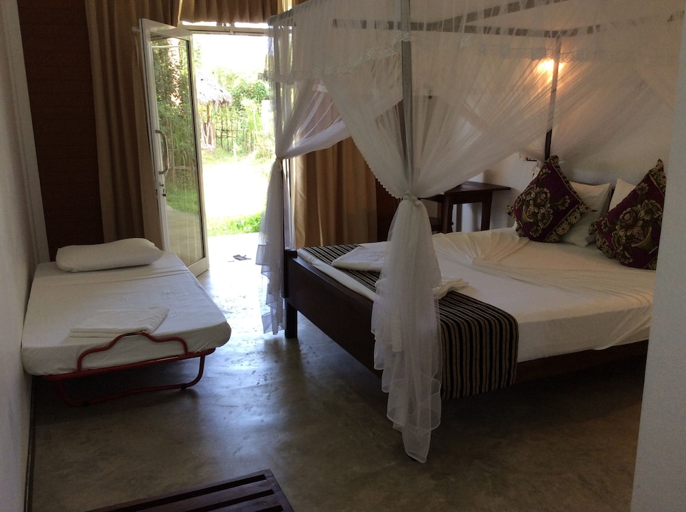 Deluxe Triple Room, Multiple Beds, Non Smoking, Garden View photo 3