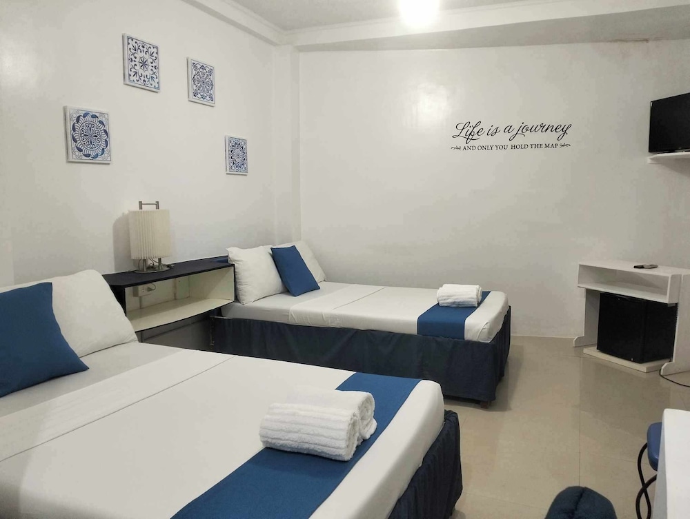 Deluxe Quad with Balcony Serene