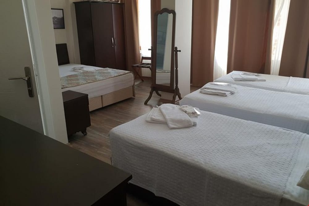 Family Quadruple Room, Garden View, Beachfront photo 1