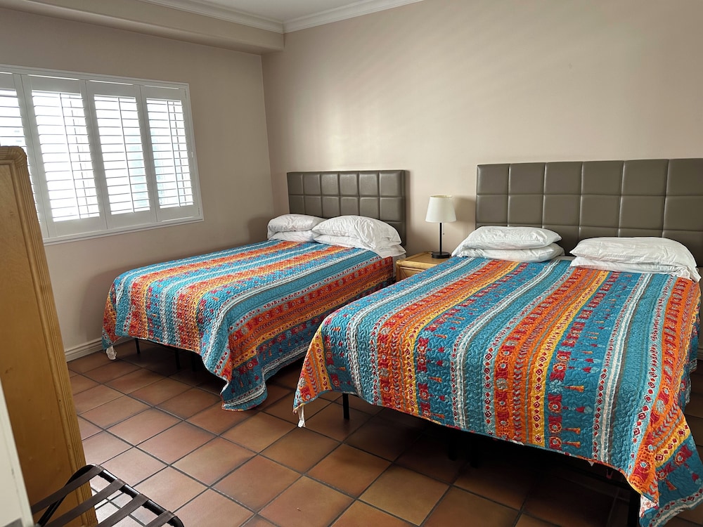 Family Quadruple Room, Multiple Beds, Non Smoking photo 2