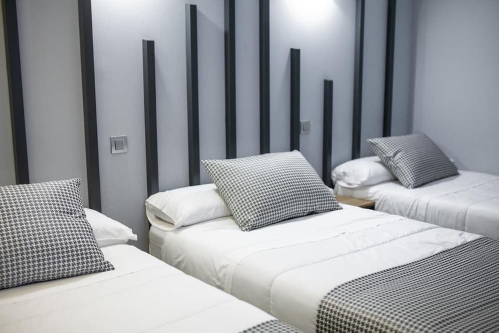 Habitación Triple, 3 camas individuales