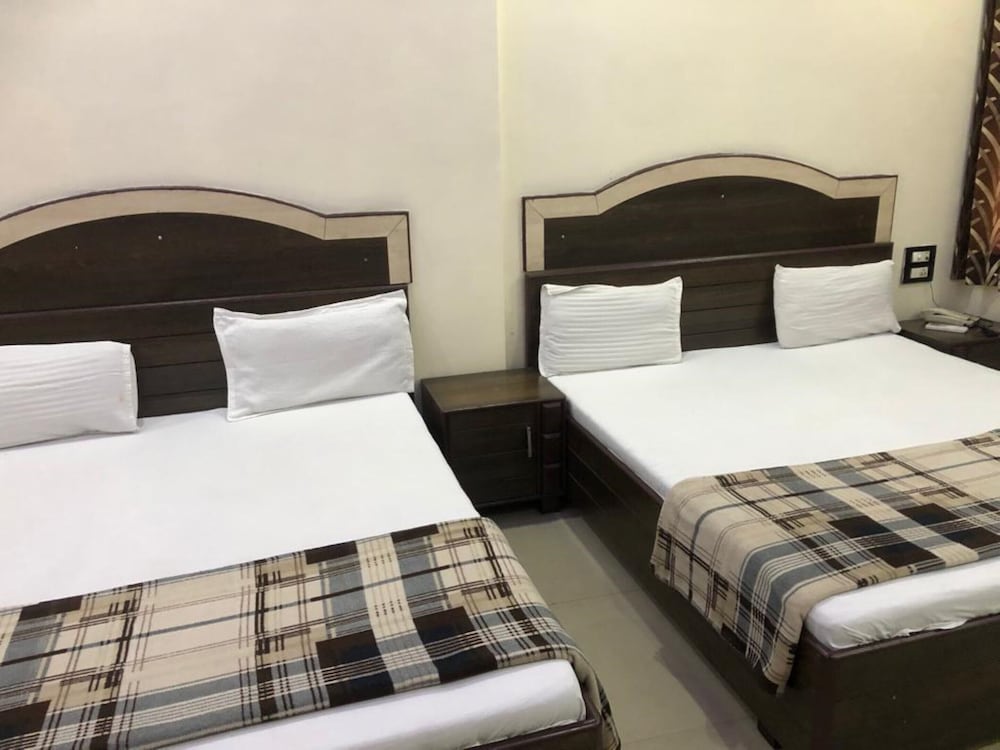 Deluxe Quadruple Room, City View