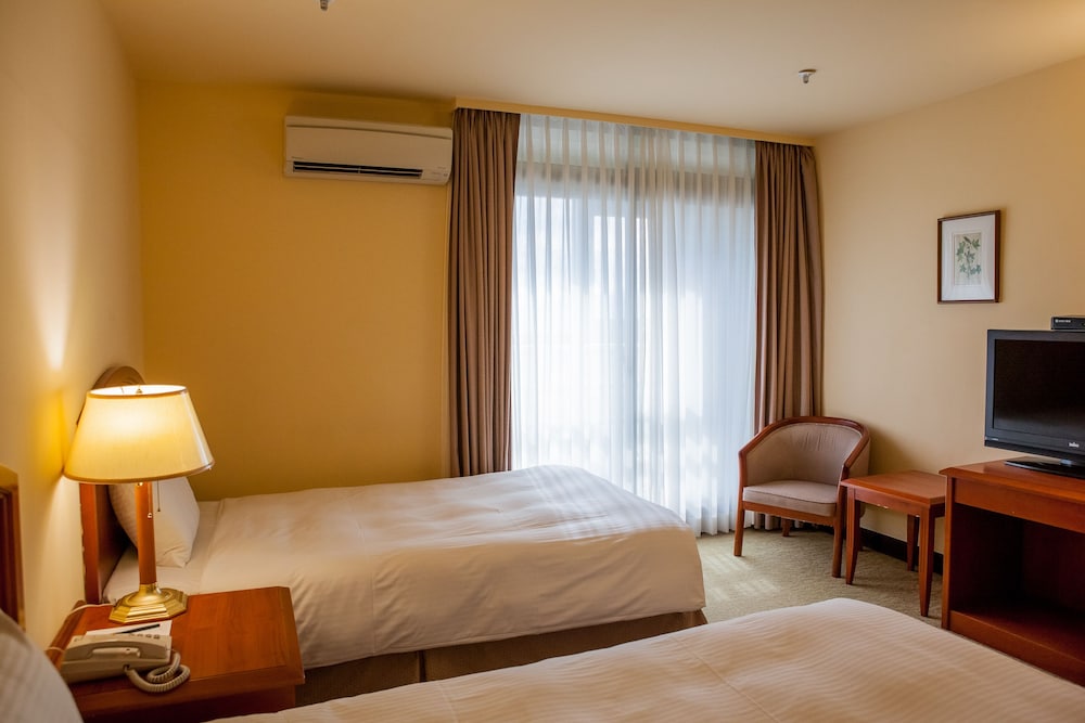 Standard Twin Room - Photo 11