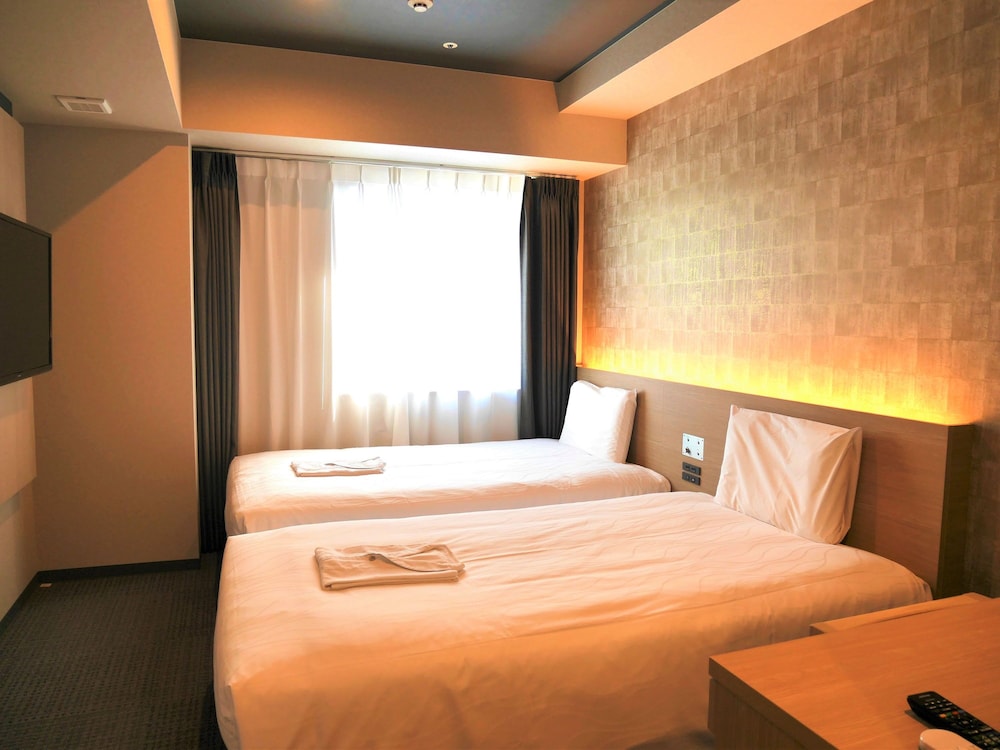 Standard Twin Room - Photo 11