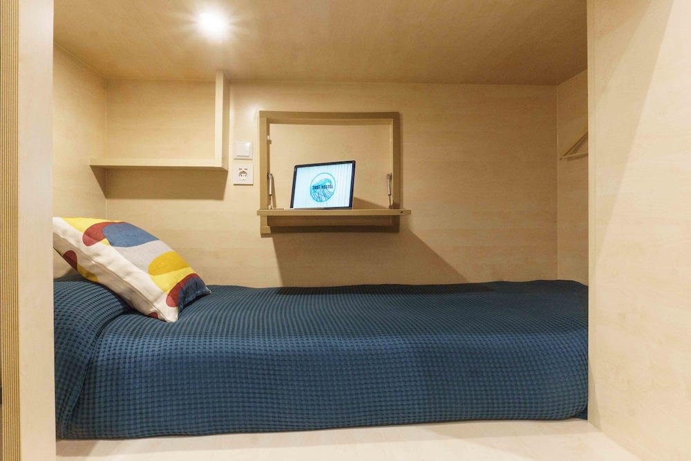 Dormitorio compartido, Dormitorio mixto, Baño compartido (1 cama en un Dormitorio de 8 camas)