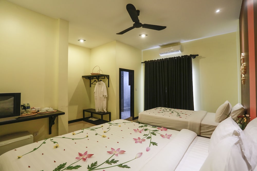 Family Deluxe Room with Balcony - Free Pick Up