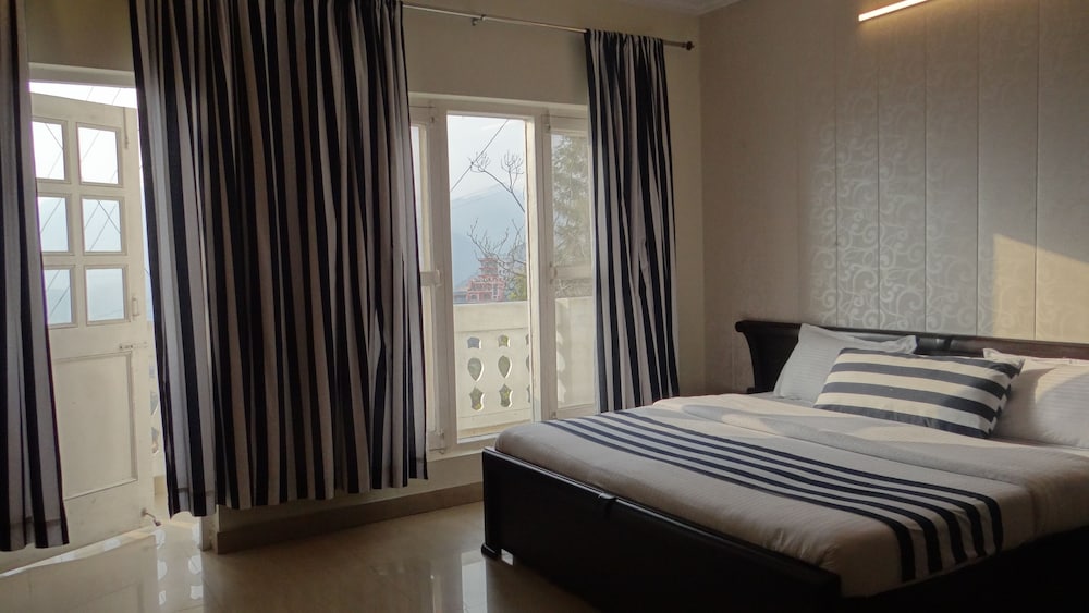 Deluxe Room - Photo 1