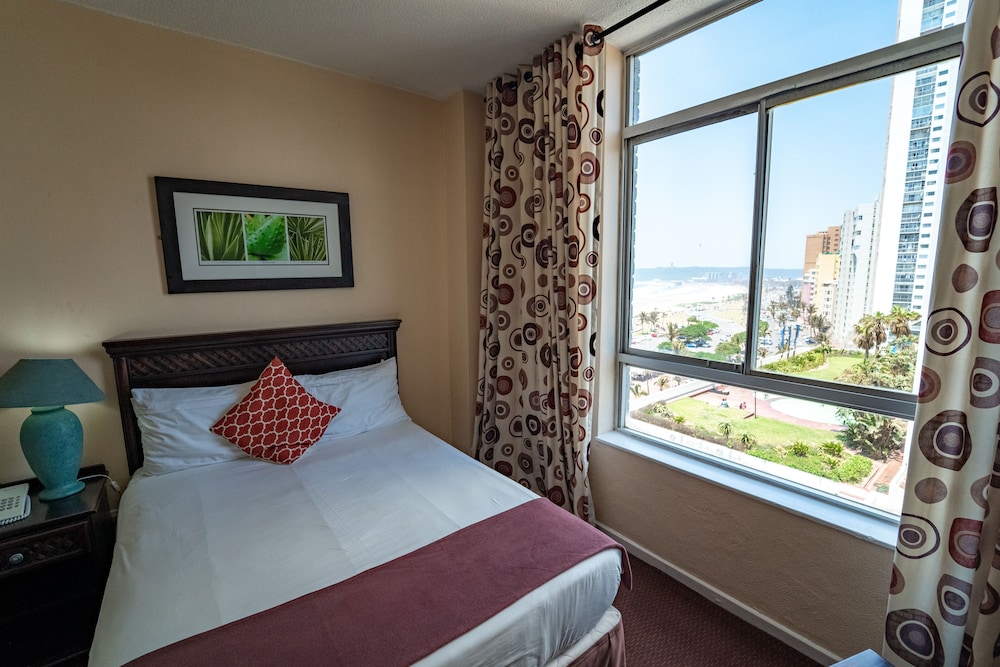 Standard Room, 2 Double Beds, Partial Sea View photo 1