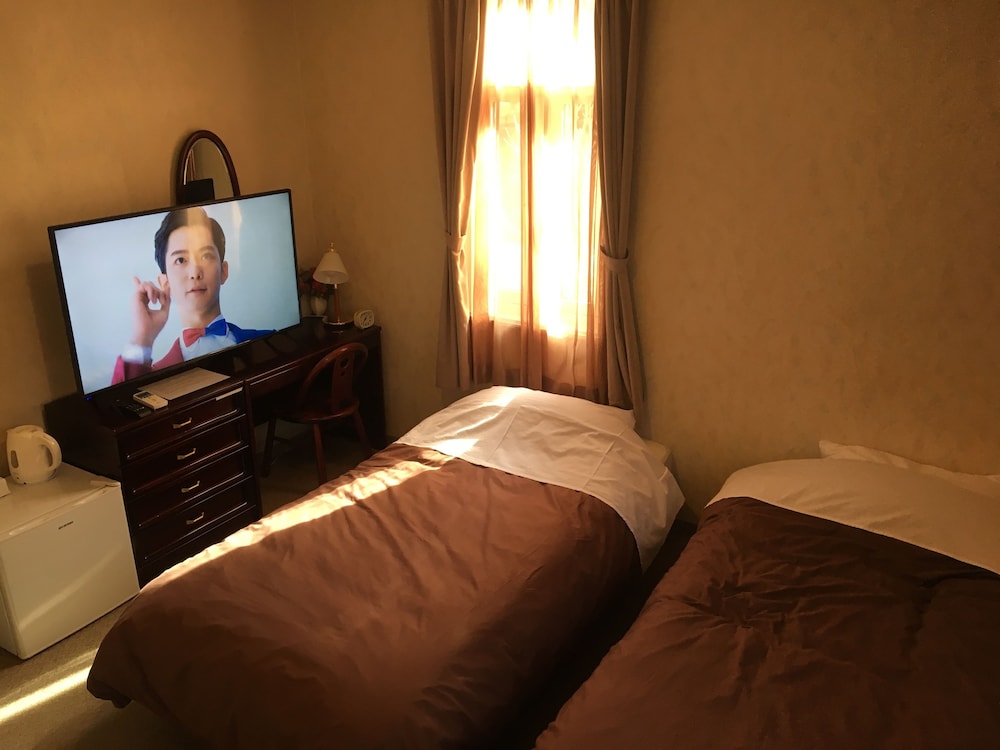 Twin Room - Photo 7