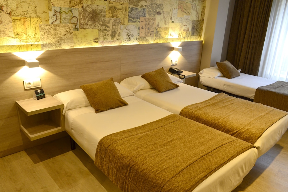 Triple Room - Photo 1