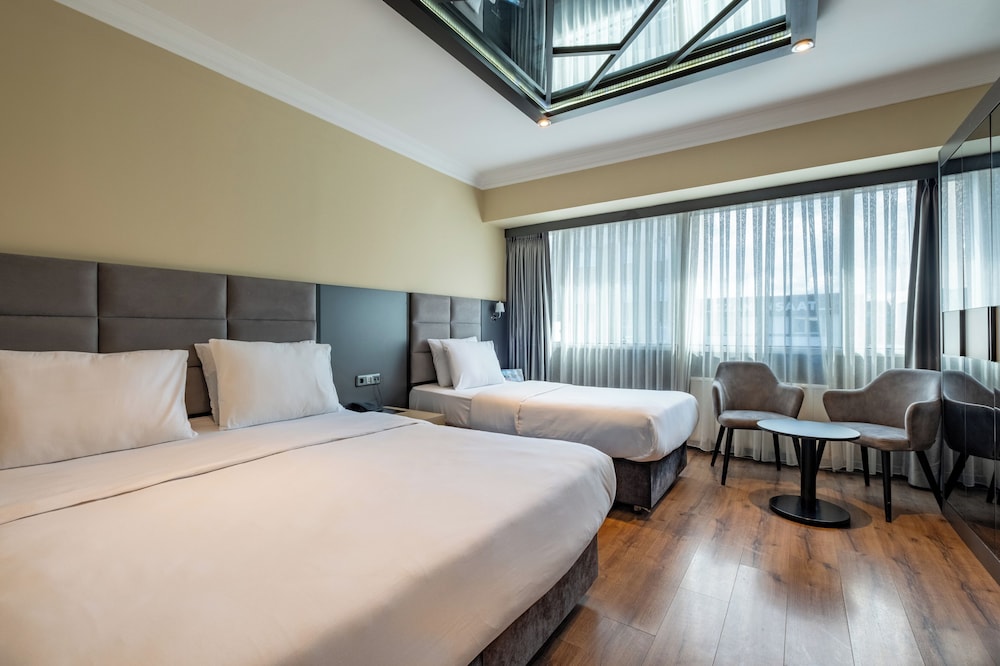 Family Triple Room - Photo 4