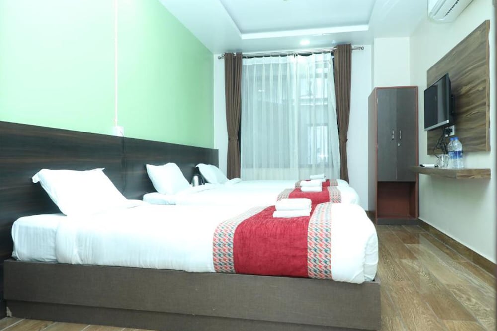Deluxe Room - Photo 1