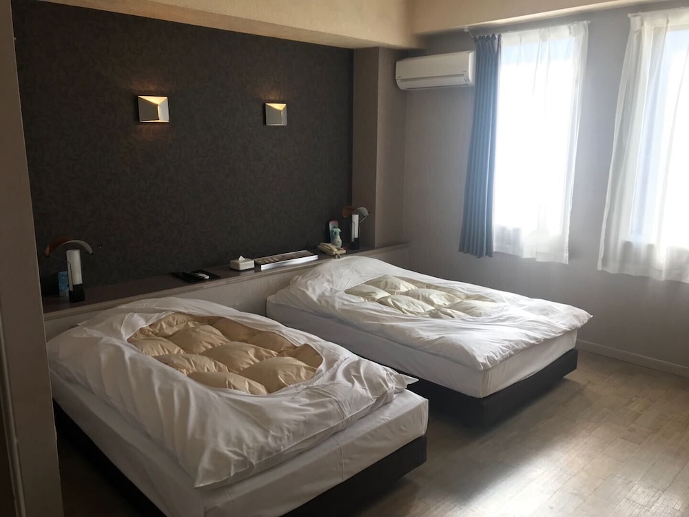 Twin Room - Photo 1
