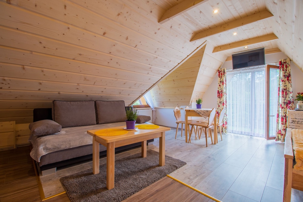 Quadruple Room (2 single and sofa)