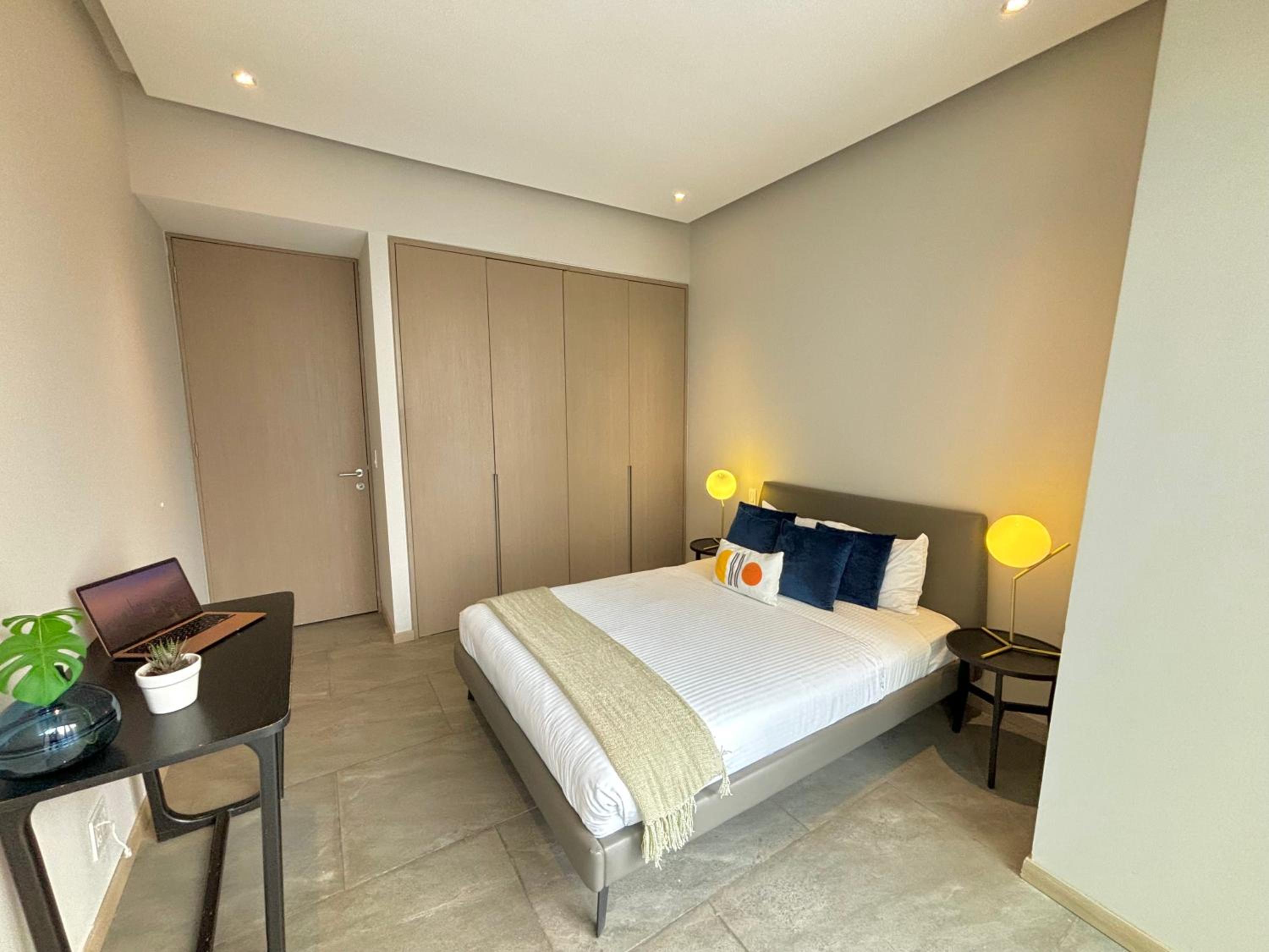 Three-Bedroom Apartment - Photo 12