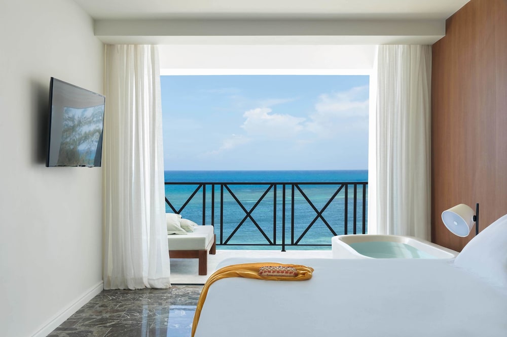 FREE UPGRADE TO EXCELLENCE CLUB JUNIOR SUITE PARTIAL OCEAN VIEW