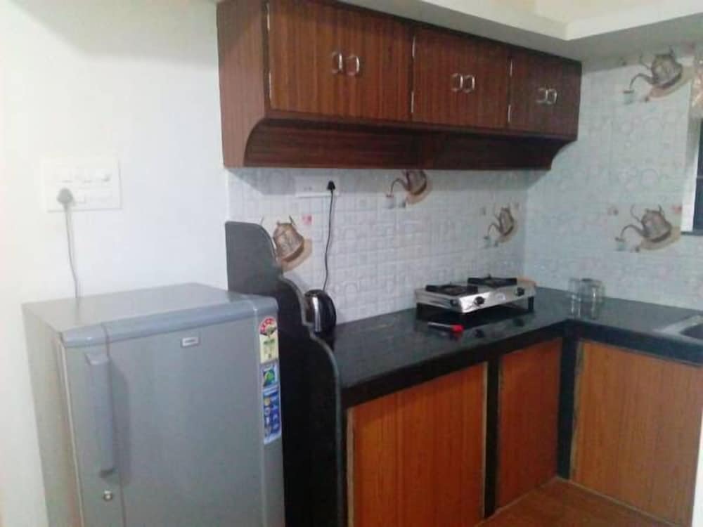 Family Quadruple Room, 2 Queen Beds, Kitchen, Beachside photo 3