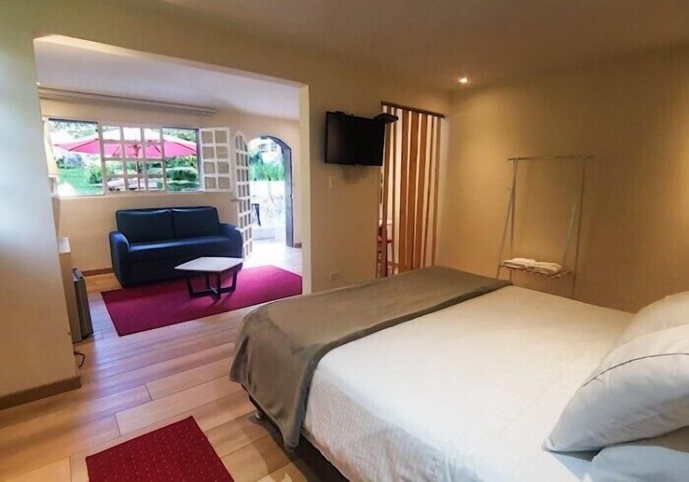 Deluxe Quadruple Room, Pool View photo 2