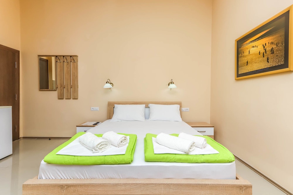Deluxe Quadruple Room (A) photo 1