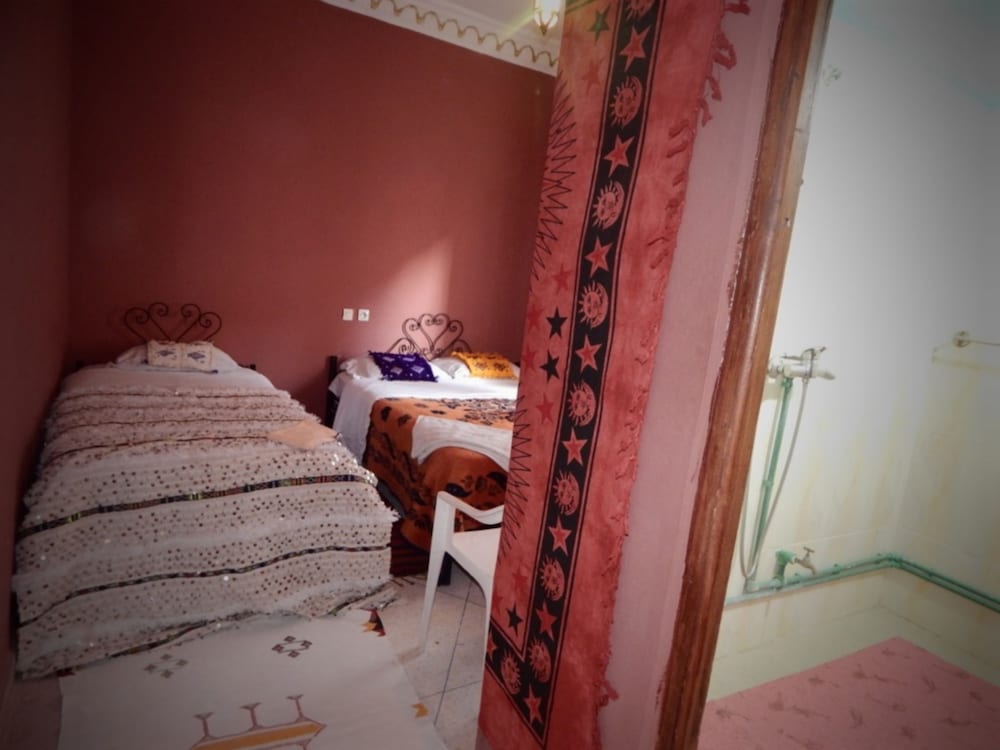 Triple Room, Multiple Beds, Private Bathroom (Figue) photo 1