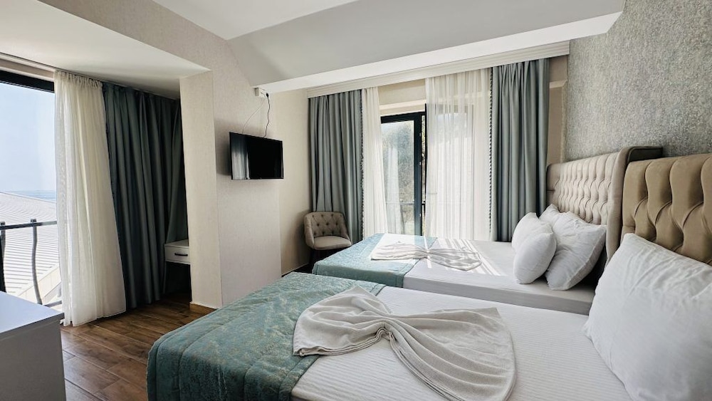 Standard Triple Room, Sea View photo 2