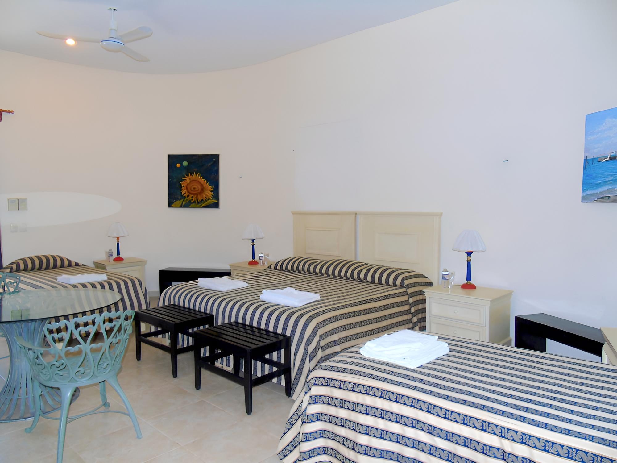 Standard Quadruple Room, Garden View photo 1