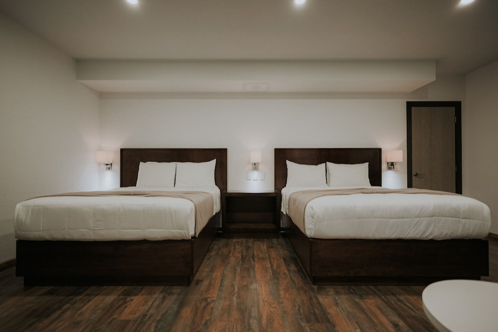 Superior Quadruple Room, 2 Queen Beds, Balcony, Vineyard View photo 3