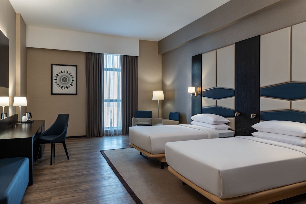 Deluxe Twin, (Comp. Shuttle to DMCC Metro, Marina Mall & JBR, 20% off on F&B outlet) photo 1