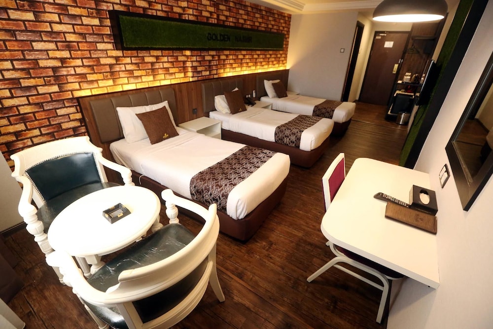Deluxe Triple Room - Photo 1