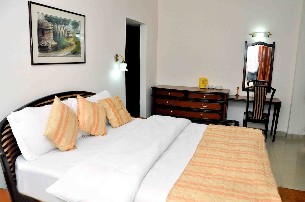 Deluxe Room - Photo 12