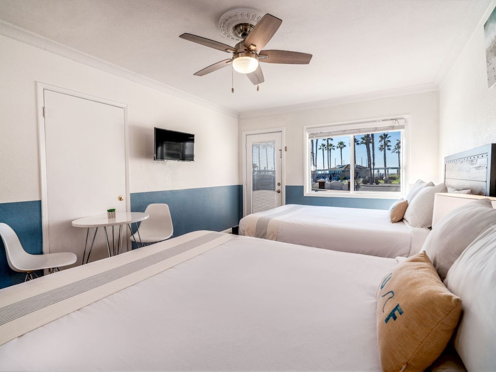 Two Queen Beds with Partial Ocean View photo 1