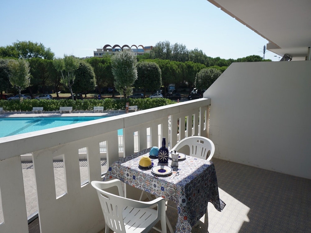 Studio, Multiple Bedrooms, Balcony, Pool View photo 2