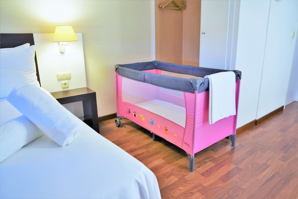 Habitación Doble (L, 1 adulto + 1 niño)