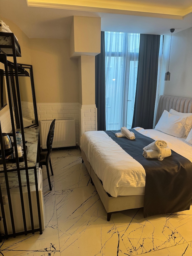Deluxe Triple Room - Photo 10