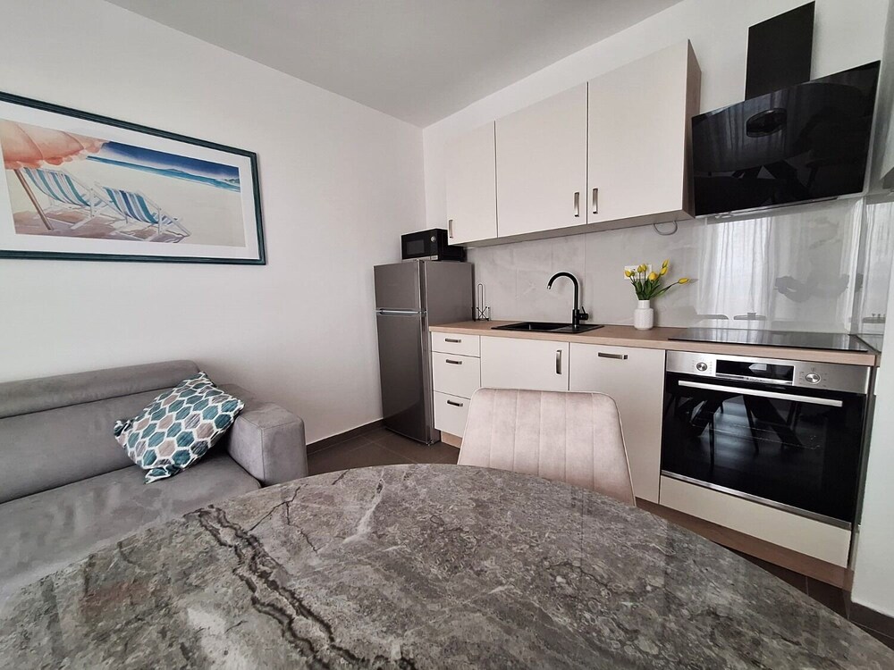Apartment (Dijana - right next to the beach - A2) photo 2