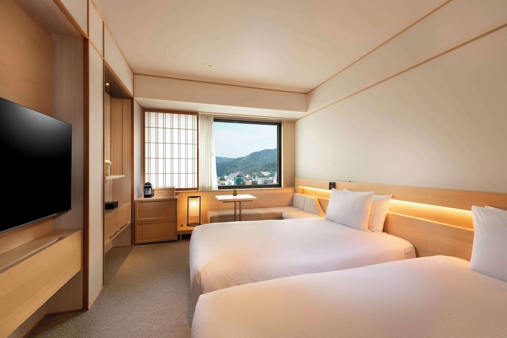 TWIN DELUXE ROOM NON SMOKING - Photo 1