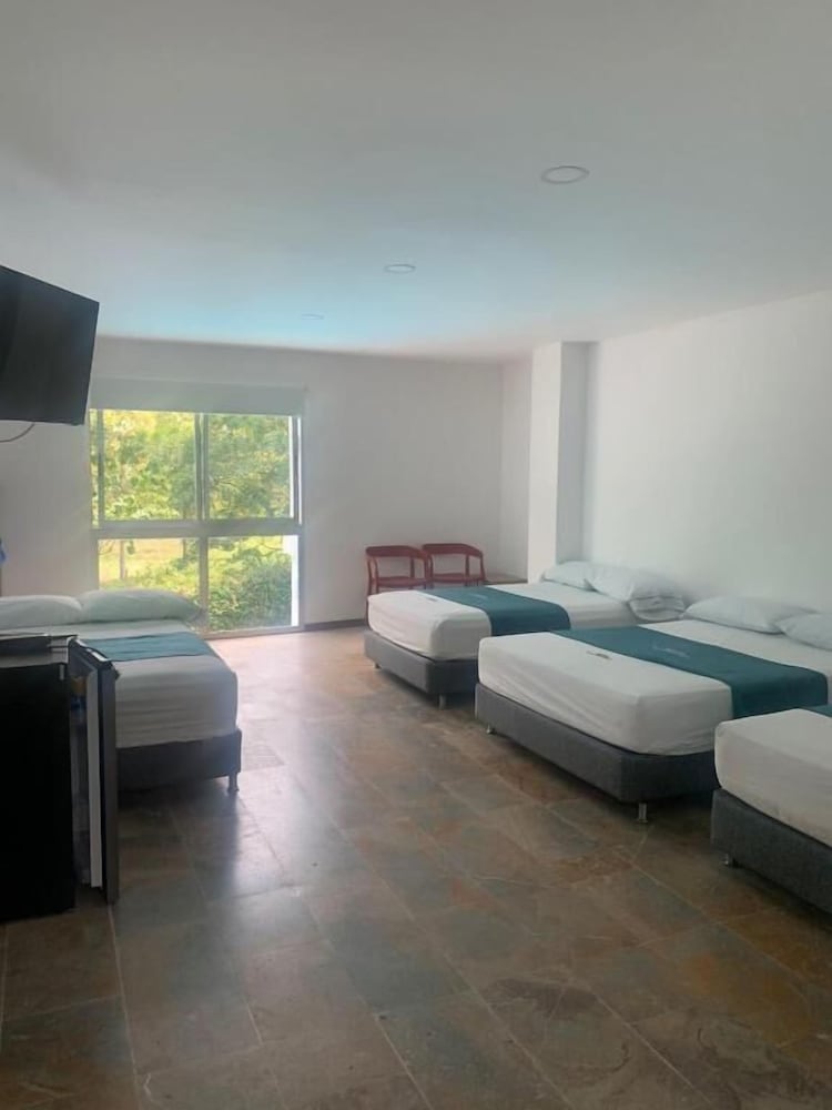 Standard Quadruple Room, Pool View photo 1