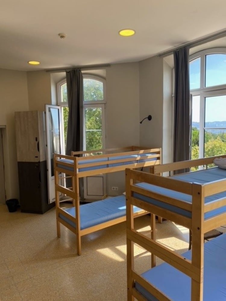 Bed in 14-Bed Mixed Dormitory - Shared Bathroom