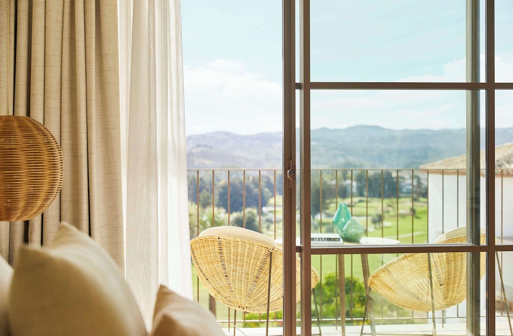Habitación Doble Cama King, Vista al Golf y Terraza Habitación Doble Cama King, Vista al Golf y Terraza