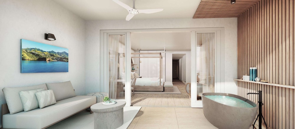 Lady Palm Club Suite with Media Room and Balcony Tranquility Soaking Tub (CBM) photo 3
