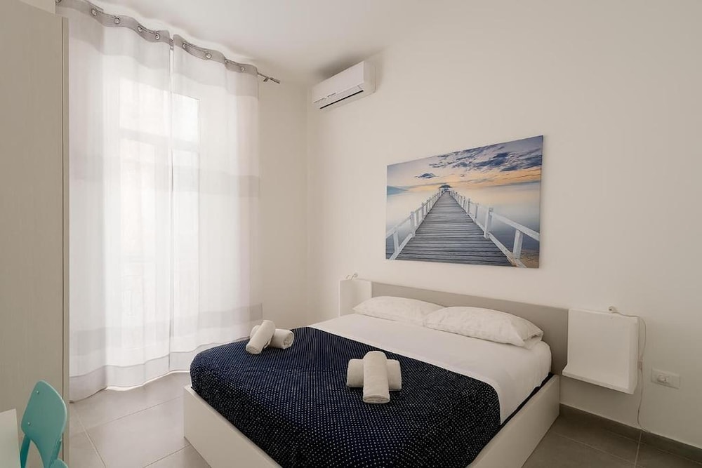 Comfort Quadruple Room, Balcony, City View