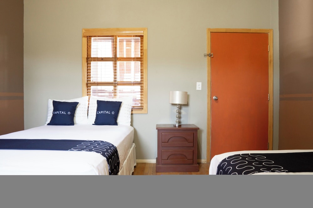 Economy Quadruple Room, 2 Double Beds photo 1