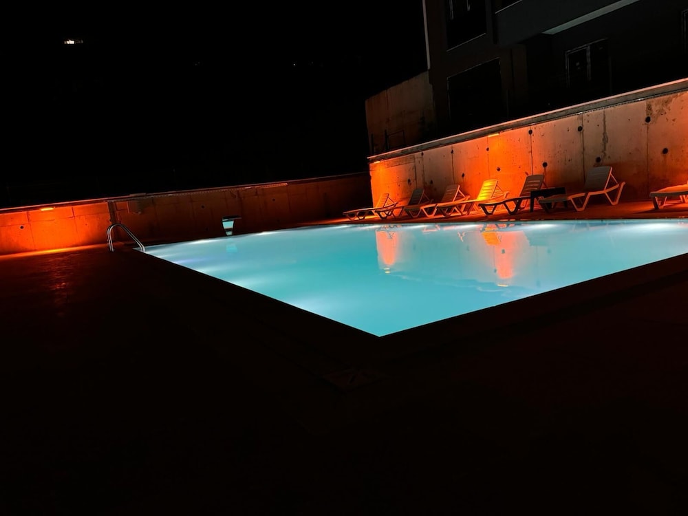 Family Room, Balcony, Pool View photo 2