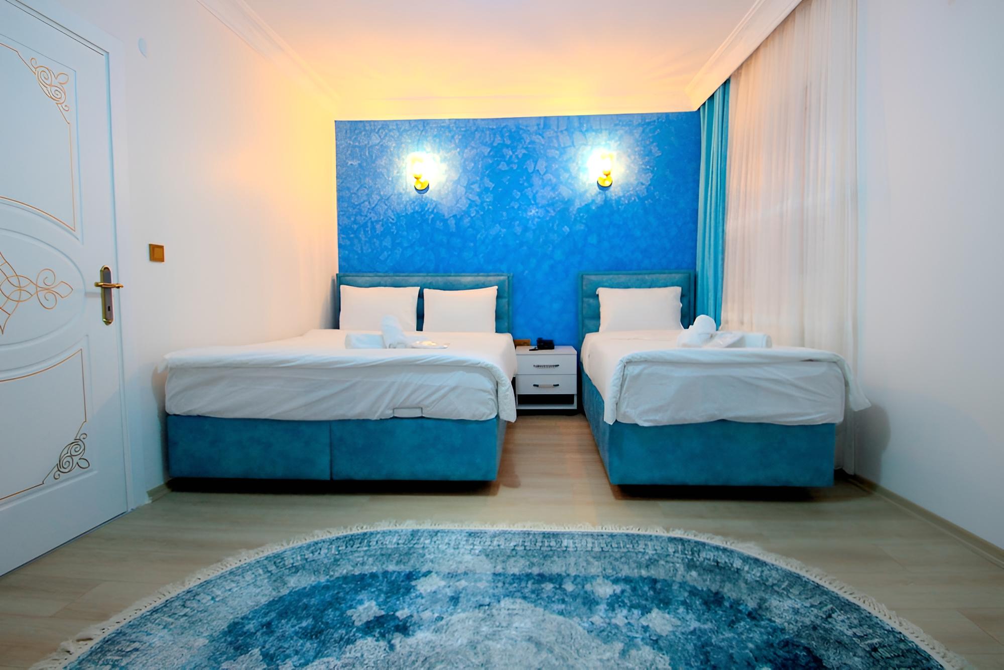 Deluxe Triple Room, 1 Bedroom, City View, Garden Area photo 1