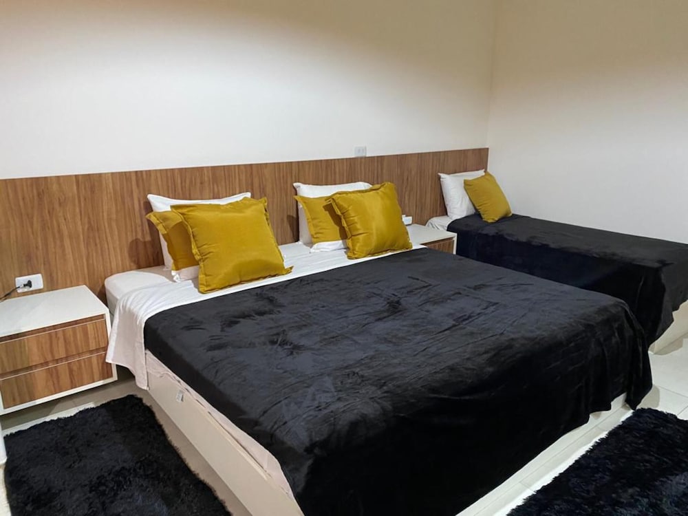Triple Room (without AC, 1 Double + 1 Single bed)