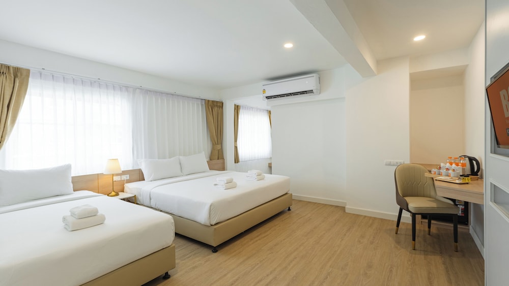 Deluxe Triple Room - Photo 1